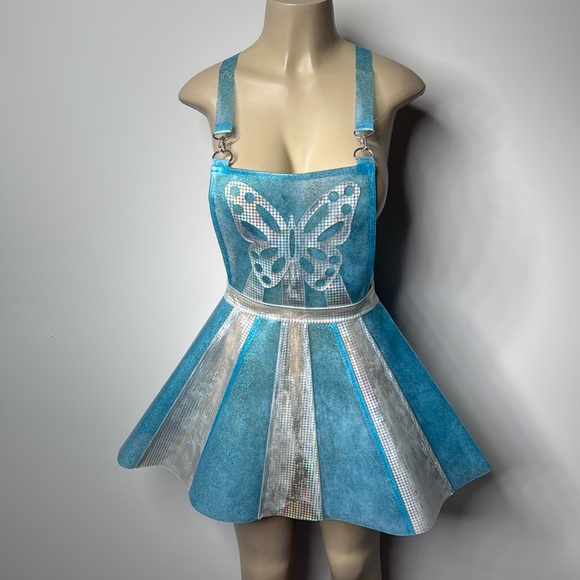 Dolls Kill Dresses & Skirts - Club Exx blue and iridescent silver overall rubber dress with butterfly detail
